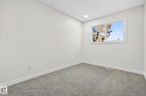 Spare room with carpet and recessed lighting - 9969 171 Avenue, Edmonton, AB - Indoor Photo Showing Other Room