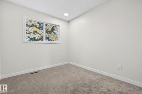 Carpeted empty room featuring baseboards and recessed lighting - 9969 171 Avenue, Edmonton, AB - Indoor Photo Showing Other Room