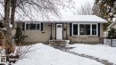 Bungalow featuring stucco siding and curved sidewalk leading to entry steps - 12231 47 Street, Edmonton, AB  - Outdoor 