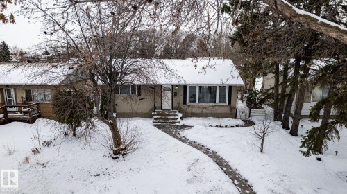 View of home from the street featuring stucco siding - 12231 47 Street, Edmonton, AB - Outdoor With Facade