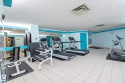 Workout area with a textured ceiling - 