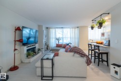 Living area with a glass covered fireplace - 