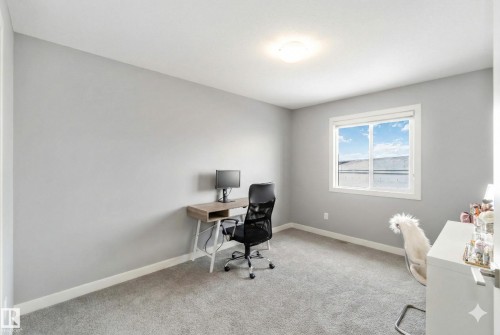 Office with baseboards and light colored carpet - 17143 38 Street, Edmonton, AB - Indoor Photo Showing Office