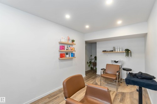 Living area with light wood-type flooring and recessed lighting - 17143 38 Street, Edmonton, AB - Indoor