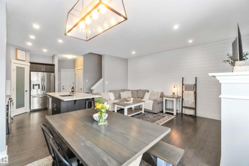 Dining area featuring dark wood-type flooring and recessed lighting - 17143 38 Street, Edmonton, AB - Indoor
