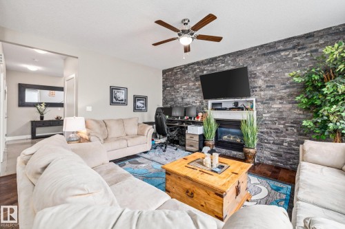 69 Cypress Link, Fort Saskatchewan, AB - Indoor Photo Showing Living Room With Fireplace