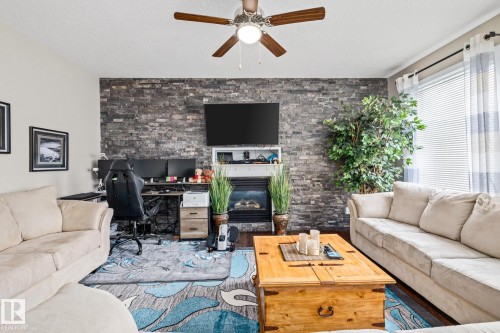 69 Cypress Link, Fort Saskatchewan, AB - Indoor Photo Showing Living Room With Fireplace