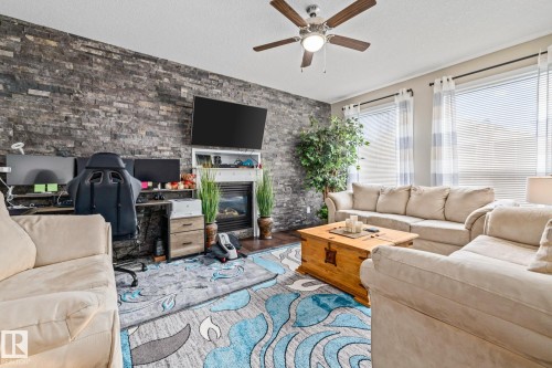 69 Cypress Link, Fort Saskatchewan, AB - Indoor Photo Showing Living Room With Fireplace