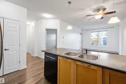 1-208 4245 139 Avenue, Edmonton, AB - Indoor Photo Showing Kitchen With Double Sink