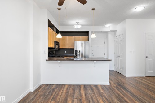 1-208 4245 139 Avenue, Edmonton, AB - Indoor Photo Showing Kitchen With Double Sink