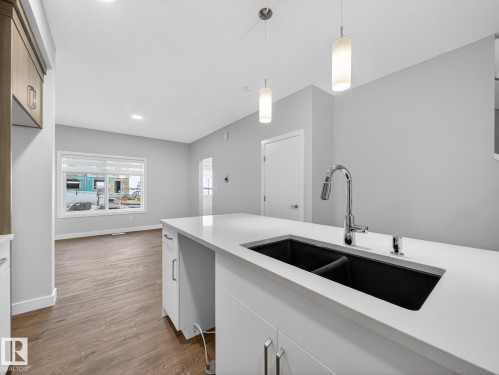 301 Brae Way, Leduc, AB - Indoor Photo Showing Kitchen With Double Sink