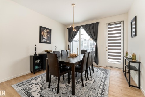 Dining space featuring light wood finished floors - 427 39 Street, Edmonton, AB - Indoor Photo Showing Dining Room