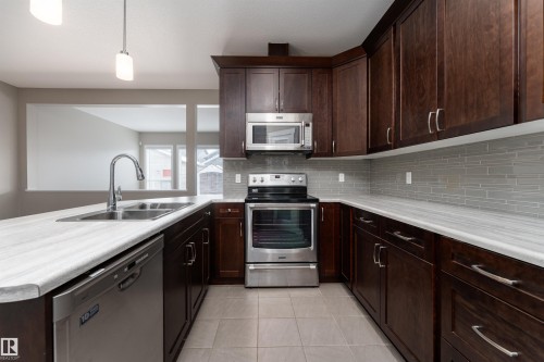 4217 Prowse Way, Edmonton, AB - Indoor Photo Showing Kitchen With Double Sink