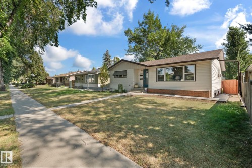 Ranch-style house with a front yard and a gate - 12107 53 Street, Edmonton, AB - Outdoor
