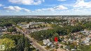 Aerial view of residential area featuring a tree filled landscape - 12107 53 Street, Edmonton, AB  - Outdoor With View 