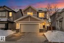 Craftsman inspired home featuring stone siding and concrete driveway - 1043 South Creek Wynd, Stony Plain, AB  - Outdoor With Facade 