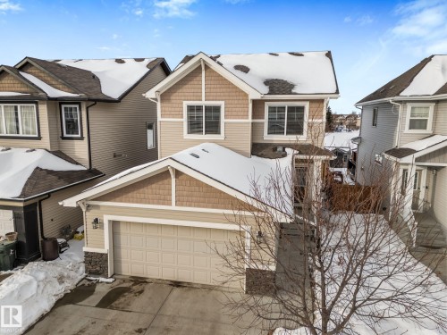 Craftsman-style home featuring concrete driveway - 1043 South Creek Wynd, Stony Plain, AB - Outdoor