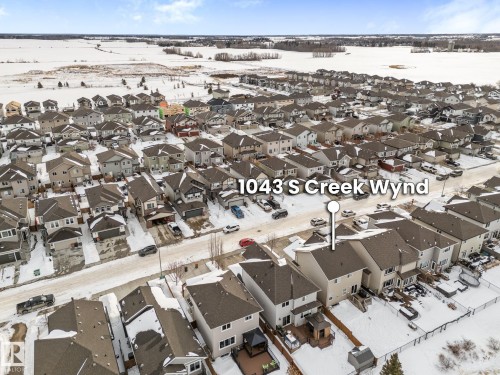 Aerial view of property's location featuring nearby suburban area - 1043 South Creek Wynd, Stony Plain, AB - Outdoor With View