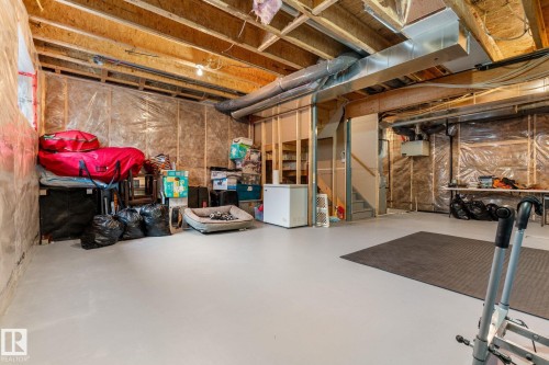 Unfinished below grade area featuring stairway - 1043 South Creek Wynd, Stony Plain, AB - Indoor Photo Showing Basement