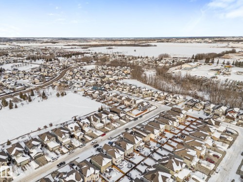 Snowy aerial view with a residential view - 1043 South Creek Wynd, Stony Plain, AB - Outdoor With View