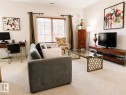 117 160 Magrath Road, Edmonton, AB  - Indoor Photo Showing Living Room 