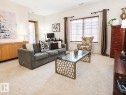 117 160 Magrath Road, Edmonton, AB  - Indoor Photo Showing Living Room 