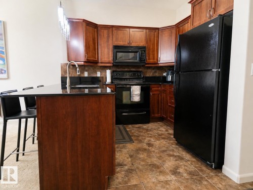 117 160 Magrath Road, Edmonton, AB - Indoor Photo Showing Kitchen