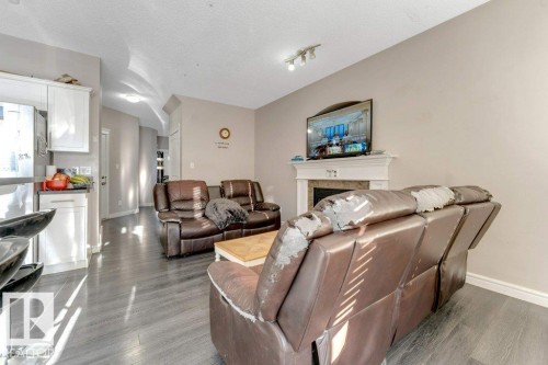 2929 16A Avenue, Edmonton, AB - Indoor Photo Showing Living Room With Fireplace