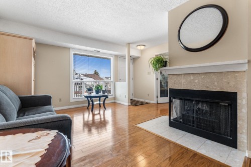 2324 151 Avenue, Edmonton, AB - Indoor Photo Showing Living Room With Fireplace
