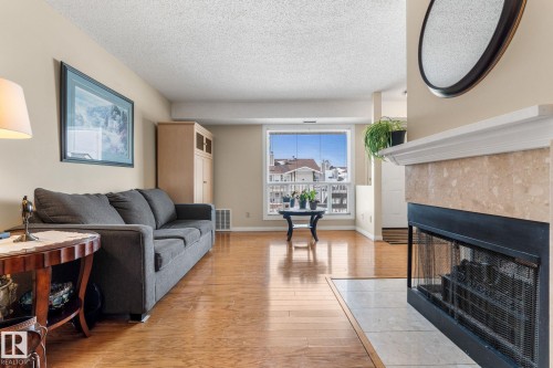 2324 151 Avenue, Edmonton, AB - Indoor Photo Showing Living Room With Fireplace