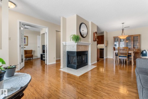 2324 151 Avenue, Edmonton, AB - Indoor Photo Showing Living Room With Fireplace