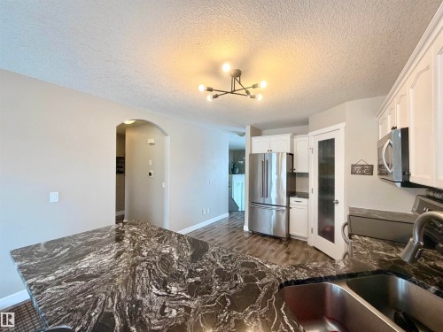 29 Walters Court, Leduc, AB - Indoor Photo Showing Kitchen With Double Sink