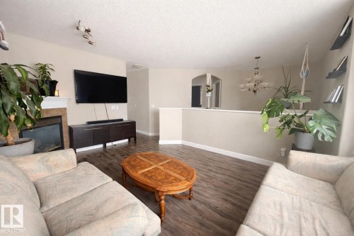 29 Walters Court, Leduc, AB - Indoor Photo Showing Living Room With Fireplace