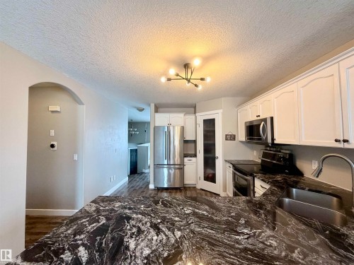 29 Walters Court, Leduc, AB - Indoor Photo Showing Kitchen With Double Sink