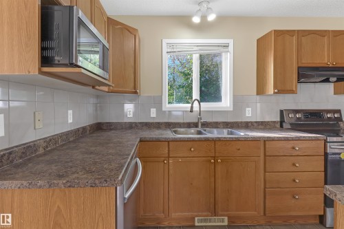 460 Gibb Wynd, Edmonton, AB - Indoor Photo Showing Kitchen With Double Sink