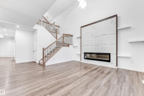 136 Creekside Lane, Leduc, AB - Indoor With Fireplace
