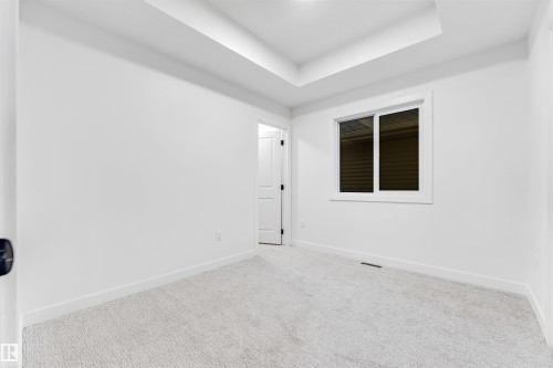 136 Creekside Lane, Leduc, AB - Indoor Photo Showing Other Room