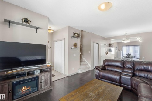 109 Santana Crescent, Fort Saskatchewan, AB - Indoor Photo Showing Living Room With Fireplace