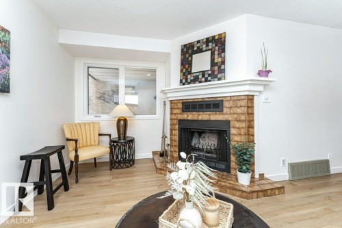 14916 43 Avenue, Edmonton, AB - Indoor Photo Showing Living Room With Fireplace