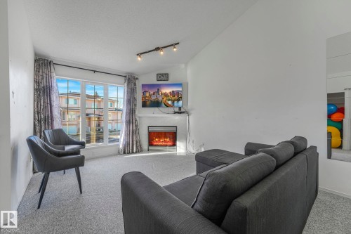 11105 9 Avenue, Edmonton, AB - Indoor Photo Showing Living Room With Fireplace