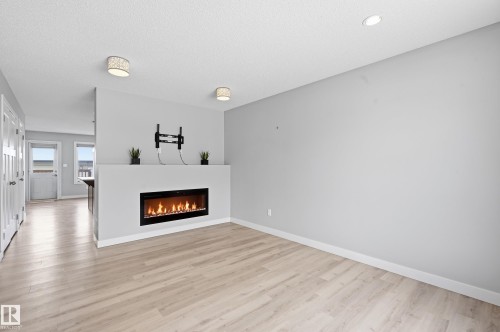 114 Richmond Link, Fort Saskatchewan, AB - Indoor Photo Showing Living Room With Fireplace