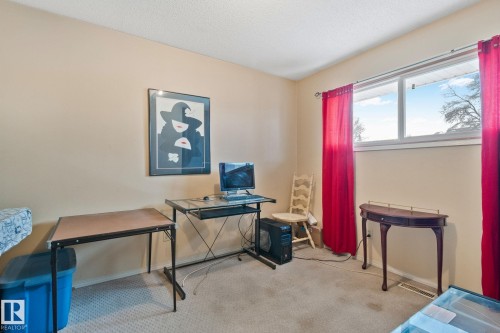 Office space featuring light carpet and a textured ceiling - 313 Willow Court, Edmonton, AB - Indoor Photo Showing Office