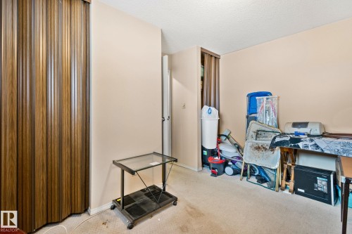 Office area with light carpet and a textured ceiling - 313 Willow Court, Edmonton, AB - Indoor Photo Showing Other Room