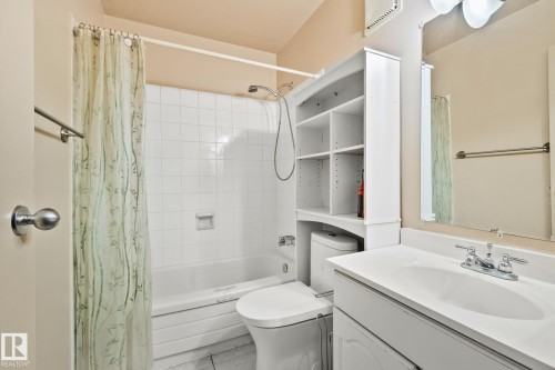 Full bath with vanity and shower / bath combination with curtain - 313 Willow Court, Edmonton, AB - Indoor Photo Showing Bathroom