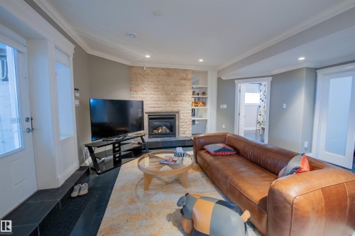 47 River Heights Drive, Edmonton, AB - Indoor Photo Showing Living Room With Fireplace