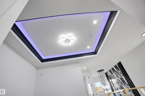 Detailed view of recessed lighting and a raised ceiling - 15415 20 Street, Edmonton, AB - Indoor Photo Showing Other Room