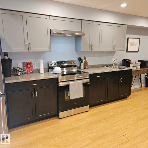 In The Basement. - 10216 89 Street, Edmonton, AB - Indoor Photo Showing Kitchen With Double Sink