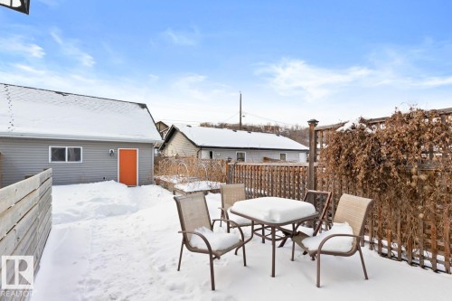Deck With An Outdoor Dining Area & Raised Garden Beds. - 10216 89 Street, Edmonton, AB - Outdoor