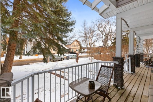 Front Porch With A View Of The Tree Lined Street. - 10216 89 Street, Edmonton, AB - Outdoor With Deck Patio Veranda With Exterior