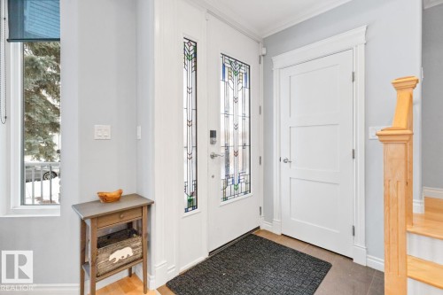 Entryway With Stained Glass Front Door & Spacious Front Closet. - 10216 89 Street, Edmonton, AB - Indoor Photo Showing Other Room